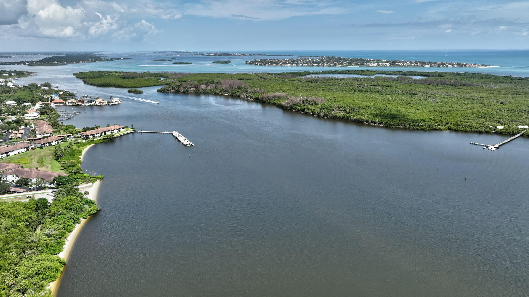 6101 Southeast Landing Way, Unit 11 Stuart, FL 34997 - Photo 48 of 55 a view of a lake with outdoor space