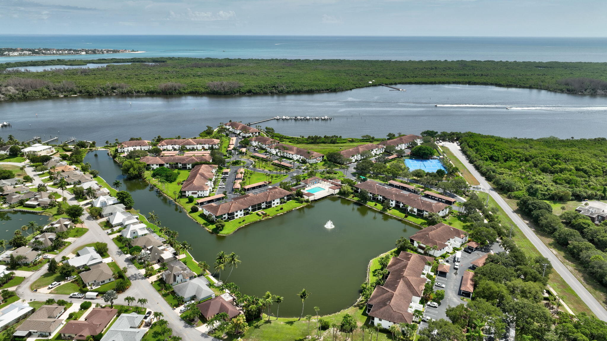 6101 Southeast Landing Way, Unit 11 Stuart, FL 34997 - Photo 51 of 55 an aerial view of a house with a lake view