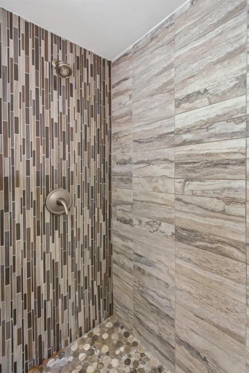 1900 68th Street North, Unit 110 St. Petersburg, FL 33710 - Photo 29 of 48 a bathroom with a shower