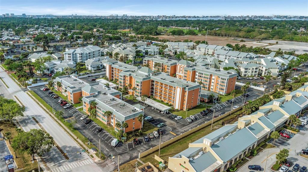 1900 68th Street North, Unit 110 St. Petersburg, FL 33710 - Photo 46 of 48 an aerial view of residential houses with outdoor space