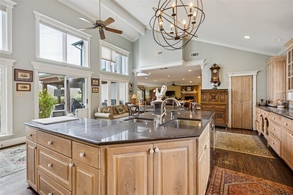 3580 Orr Road Fairview, TX 75002 - Photo 14 of 40 a kitchen with sink stove and cabinets