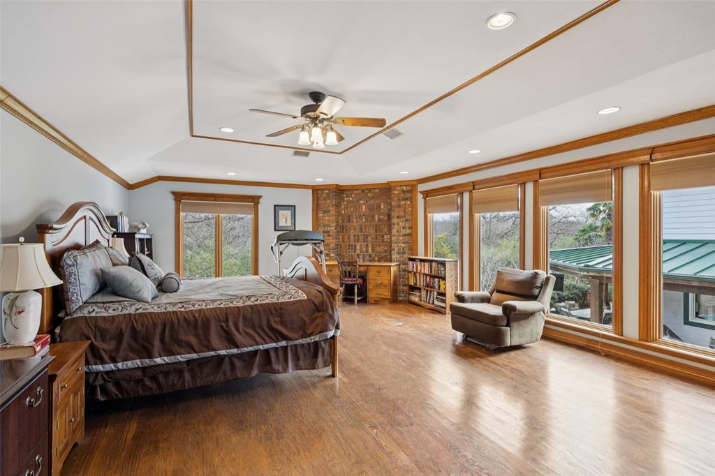 3580 Orr Road Fairview, TX 75002 - Photo 15 of 40 a bedroom with furniture and large windows