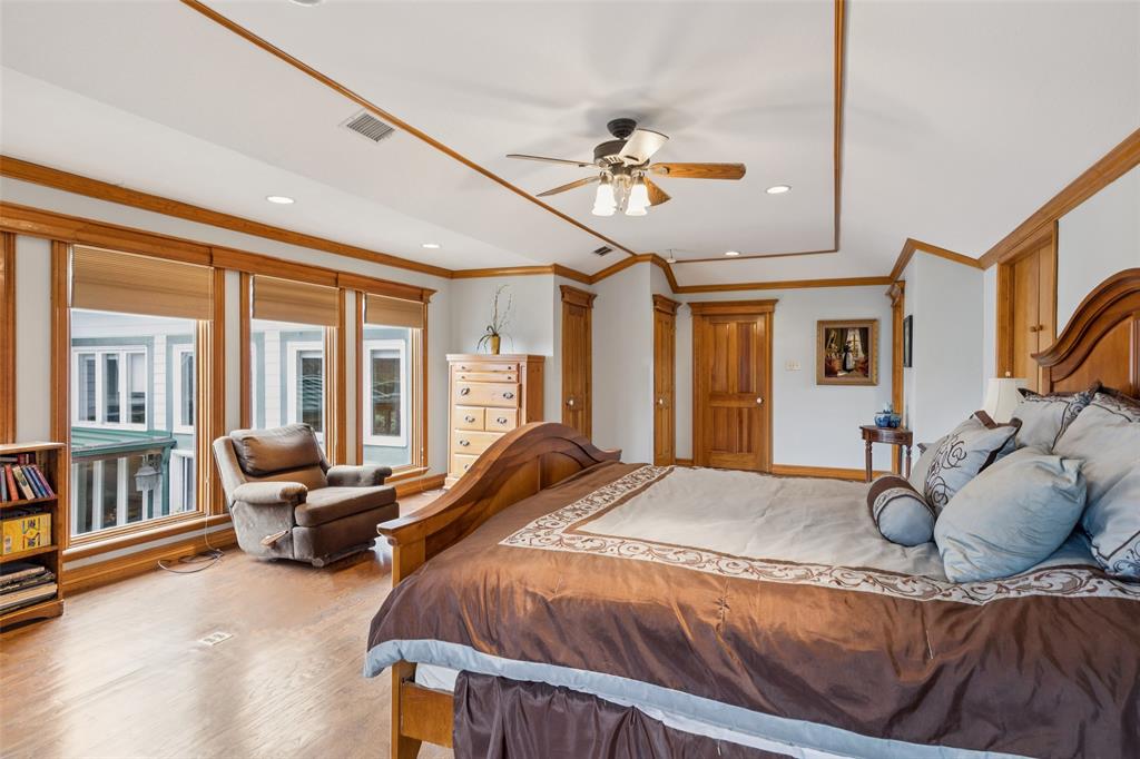 3580 Orr Road Fairview, TX 75002 - Photo 16 of 40 a bedroom with a bed couch and large windows