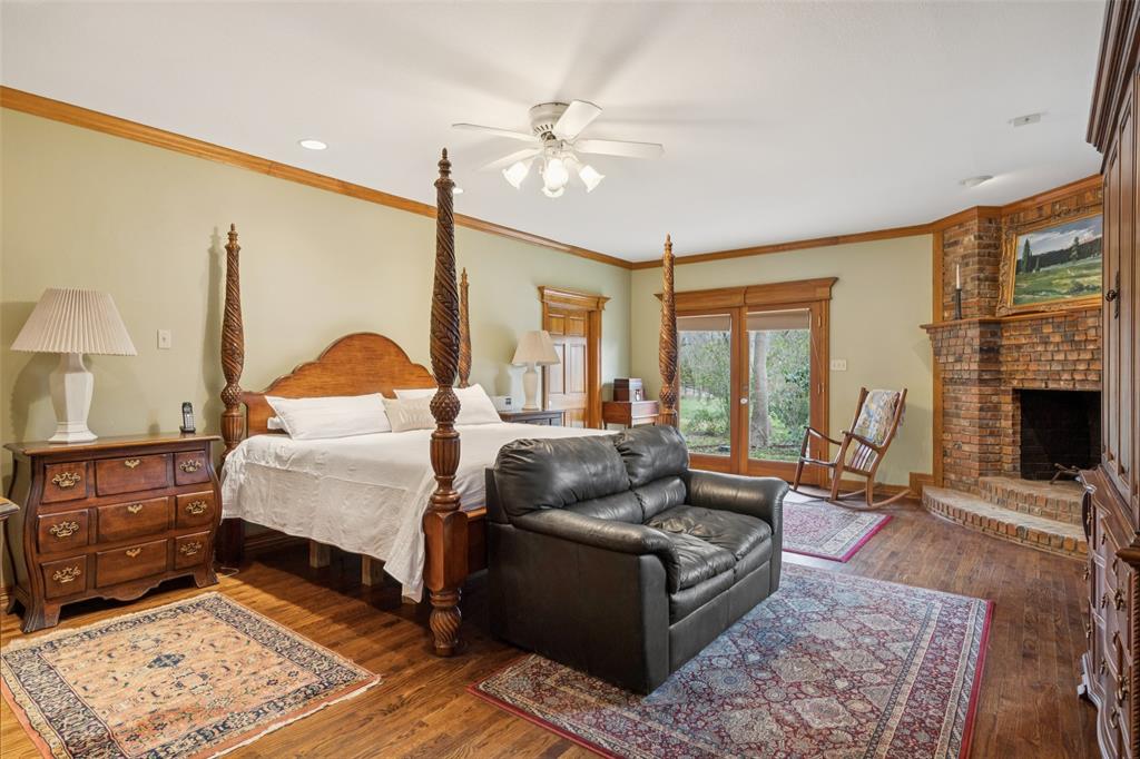3580 Orr Road Fairview, TX 75002 - Photo 18 of 40 a living room with furniture and a fireplace