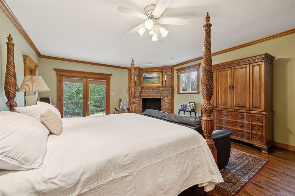 3580 Orr Road Fairview, TX 75002 - Photo 19 of 40 a bedroom with a bed dresser and a window