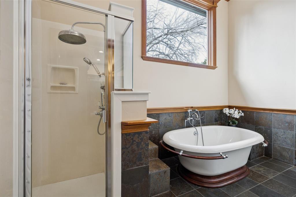 3580 Orr Road Fairview, TX 75002 - Photo 22 of 40 a bathroom with a sink and a mirror