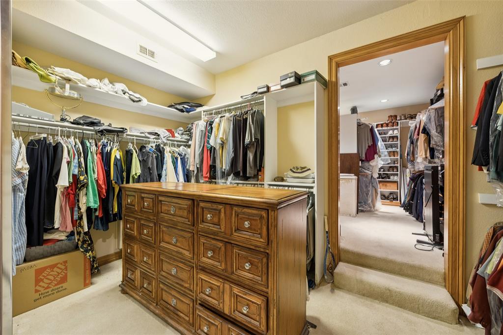 3580 Orr Road Fairview, TX 75002 - Photo 23 of 40 a view of walk in closet with clothes