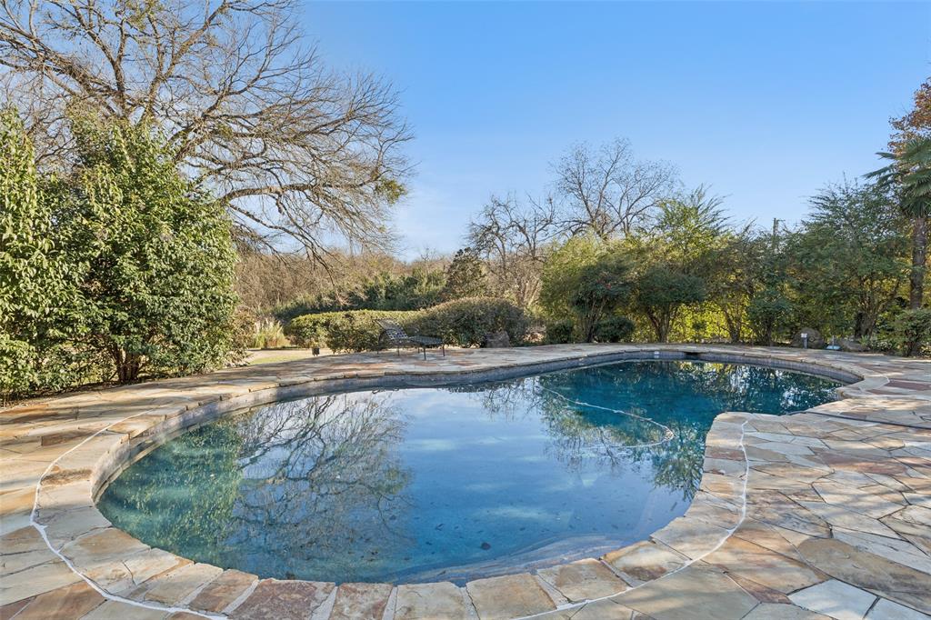 3580 Orr Road Fairview, TX 75002 - Photo 32 of 40 a view of a swimming pool with a yard