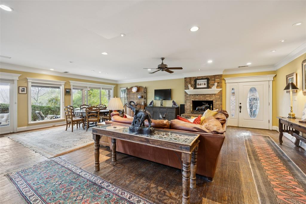 3580 Orr Road Fairview, TX 75002 - Photo 10 of 40 a living room with furniture fireplace and a table