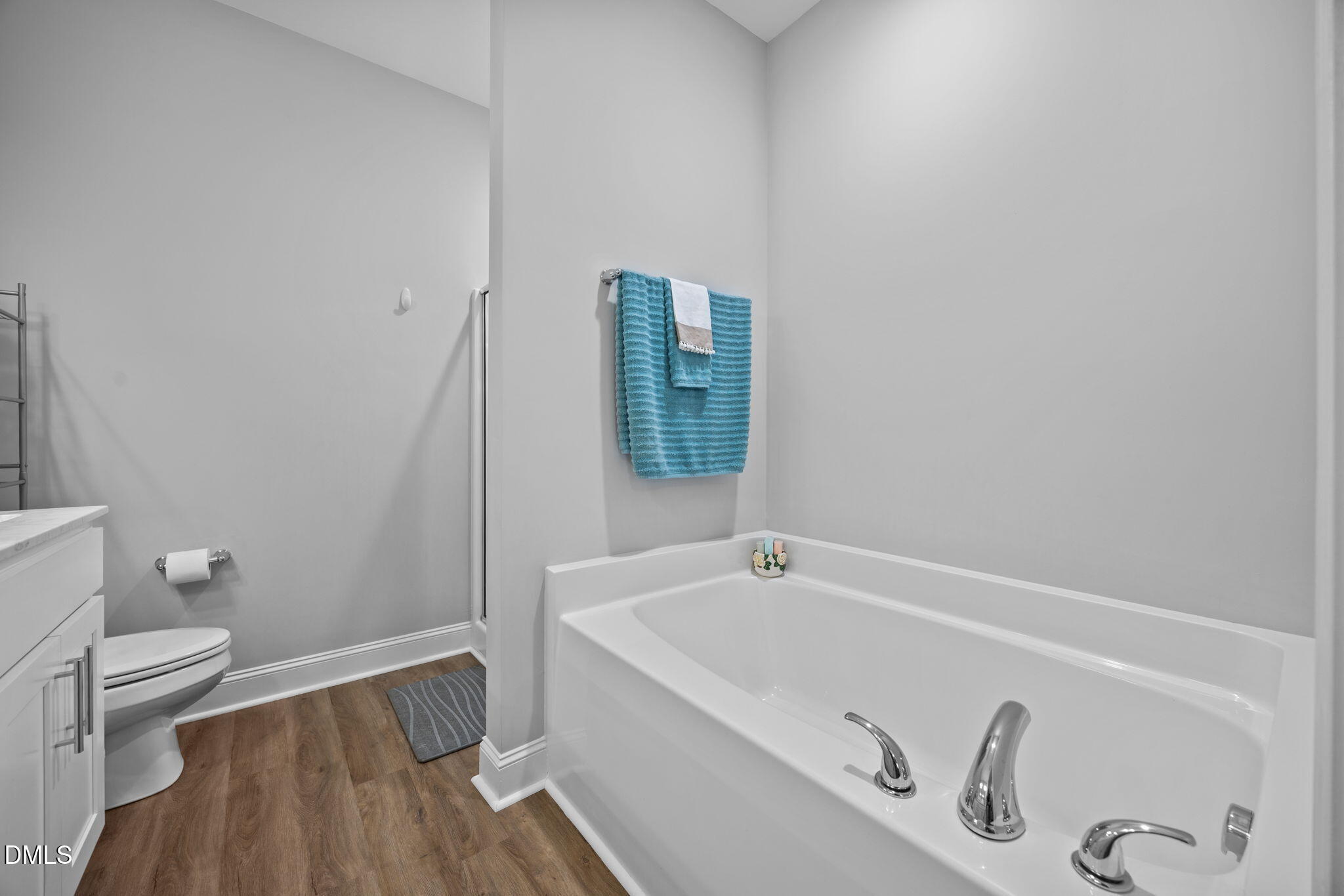 126 Arrow Lane Middlesex, NC 27557 - Photo 16 of 32 a bathroom with a tub and a toilet