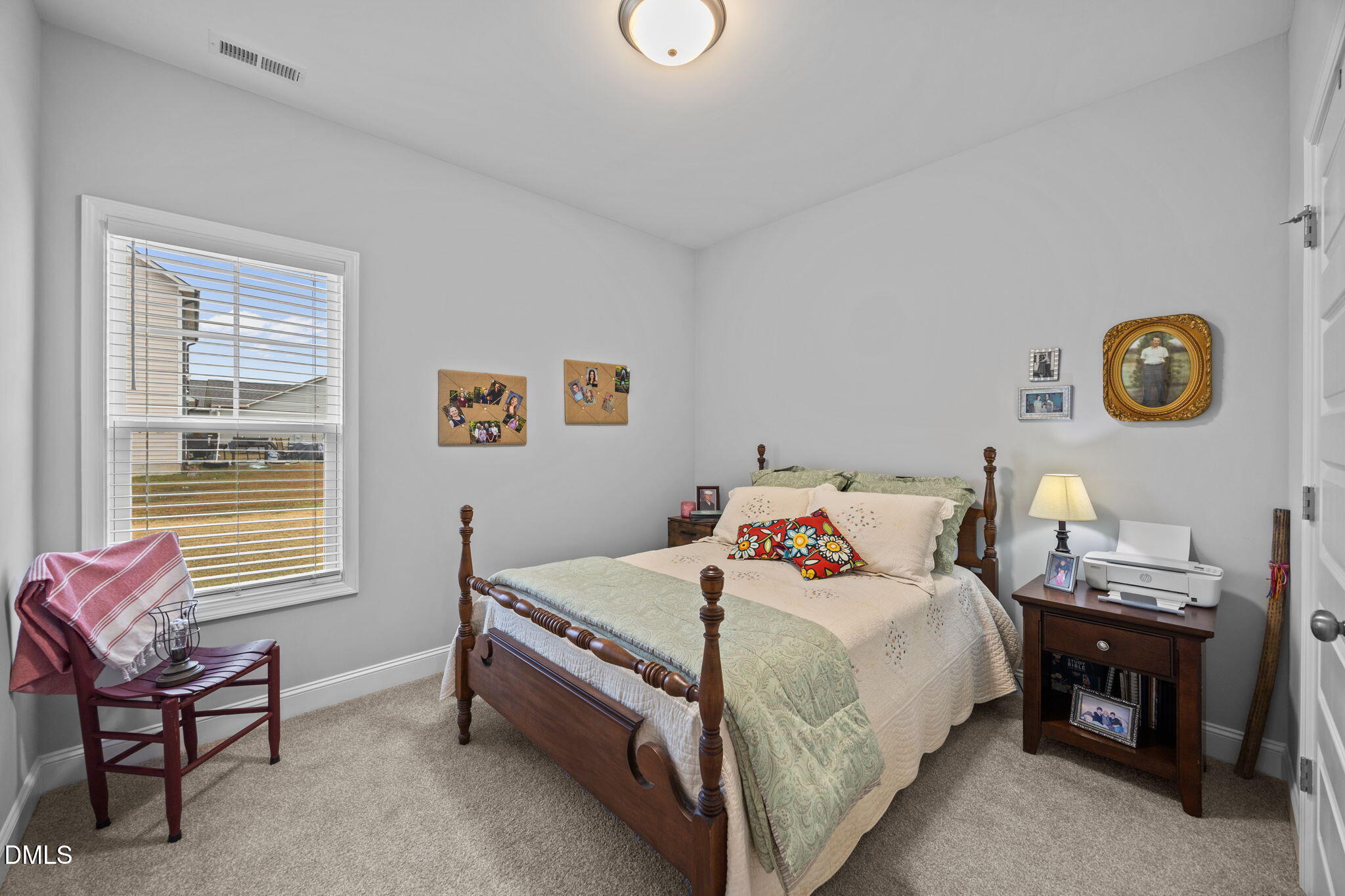 126 Arrow Lane Middlesex, NC 27557 - Photo 19 of 32 a bedroom with a bed and a window