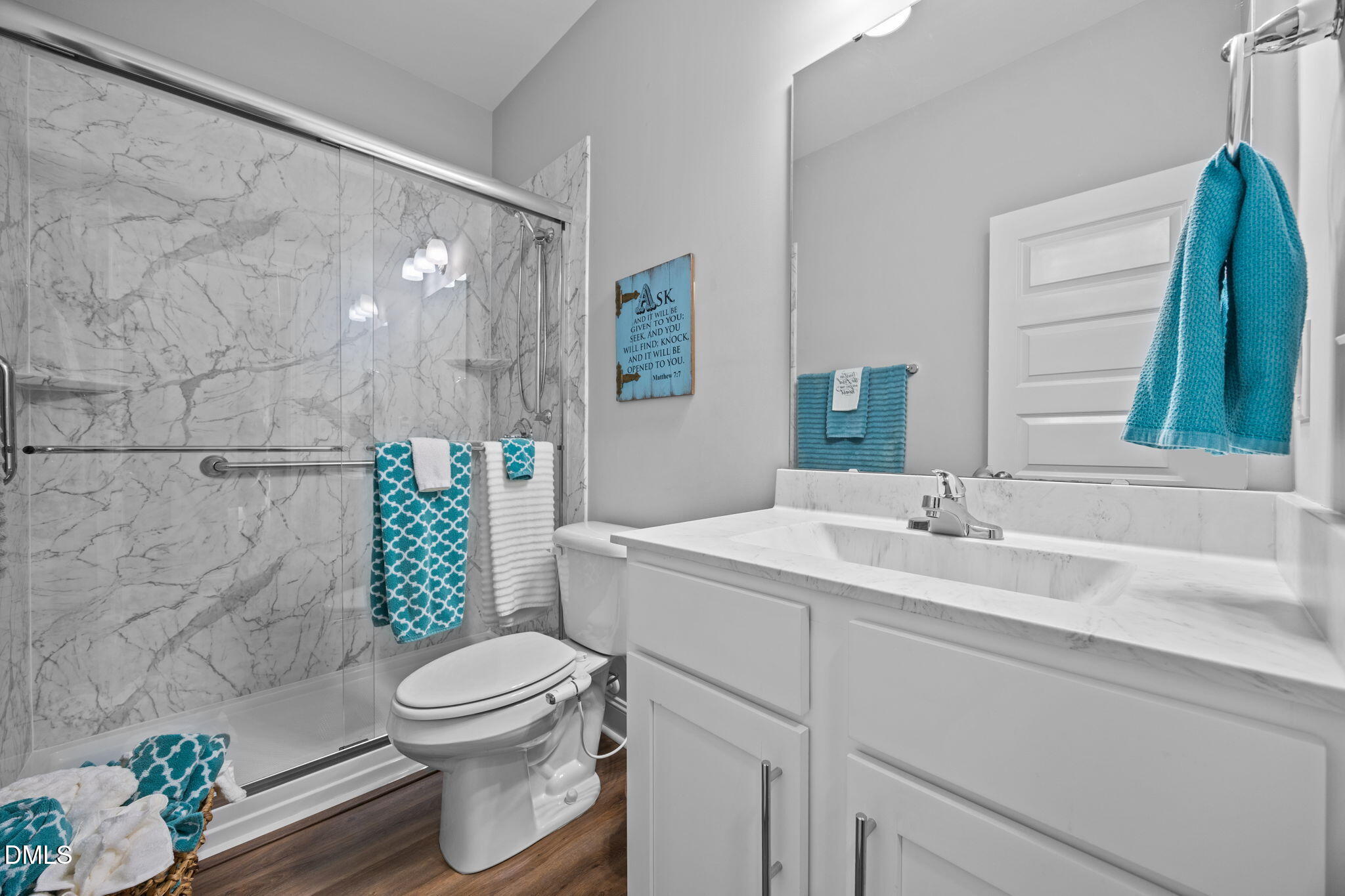 126 Arrow Lane Middlesex, NC 27557 - Photo 20 of 32 a bathroom with a sink a toilet and shower