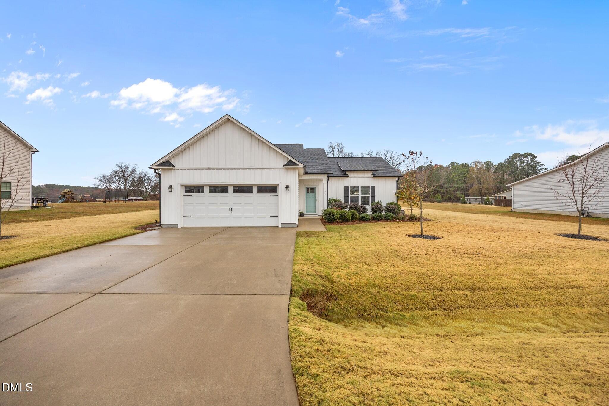 126 Arrow Lane Middlesex, NC 27557 - Photo 30 of 32 a swimming pool with an ocean view
