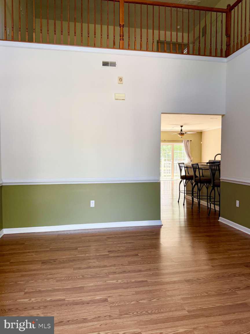 629 Ruxton Road, Unit 74 Solomons, MD 20629 - Photo 6 of 24 a view of kitchen with table and chairs