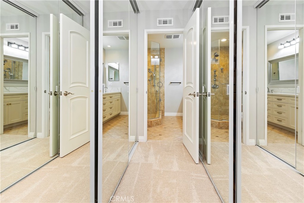38 Racing Wind Irvine, CA 92614 - Photo 13 of 19 view of a bathroom with a shower and a sink