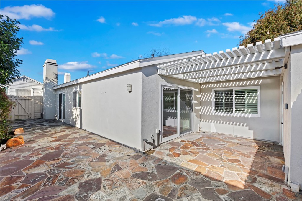 38 Racing Wind Irvine, CA 92614 - Photo 9 of 19 a view of a house with backyard