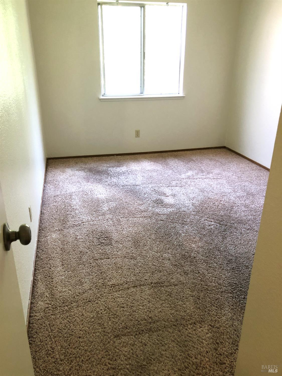 7645 Camino Colegio Rohnert Park, CA 94928 - Photo 7 of 14 an empty room with a window