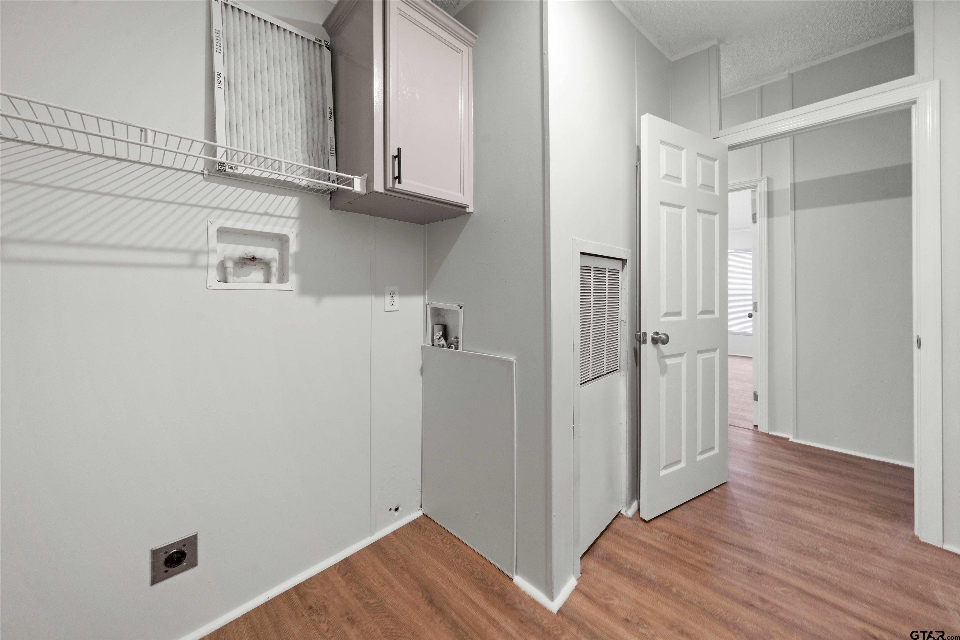 10490 Peterson Tyler, TX 75708 - Photo 17 of 30 a view of a kitchen with wooden floor