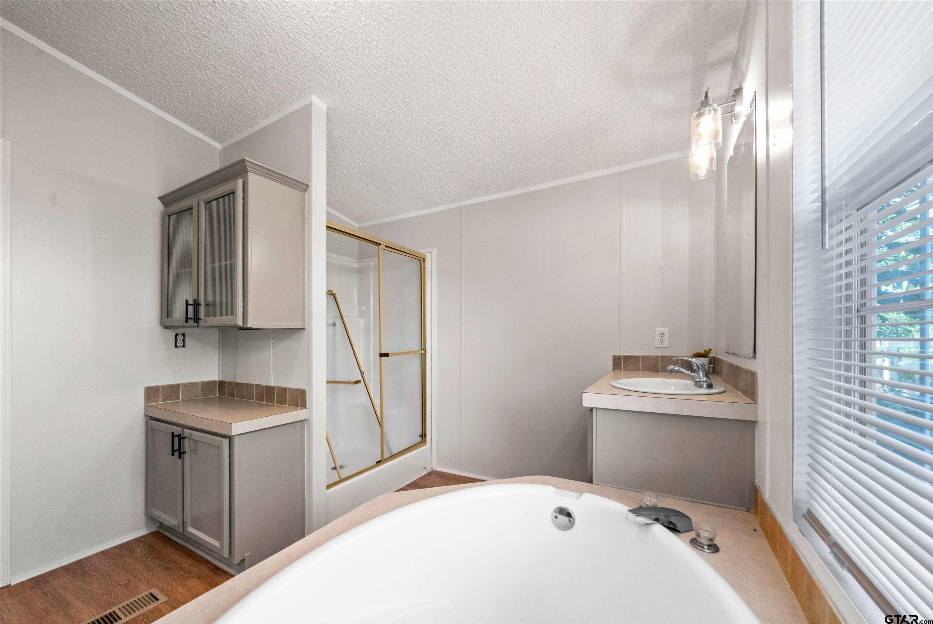 10490 Peterson Tyler, TX 75708 - Photo 28 of 30 a room with a sink washer and dryer