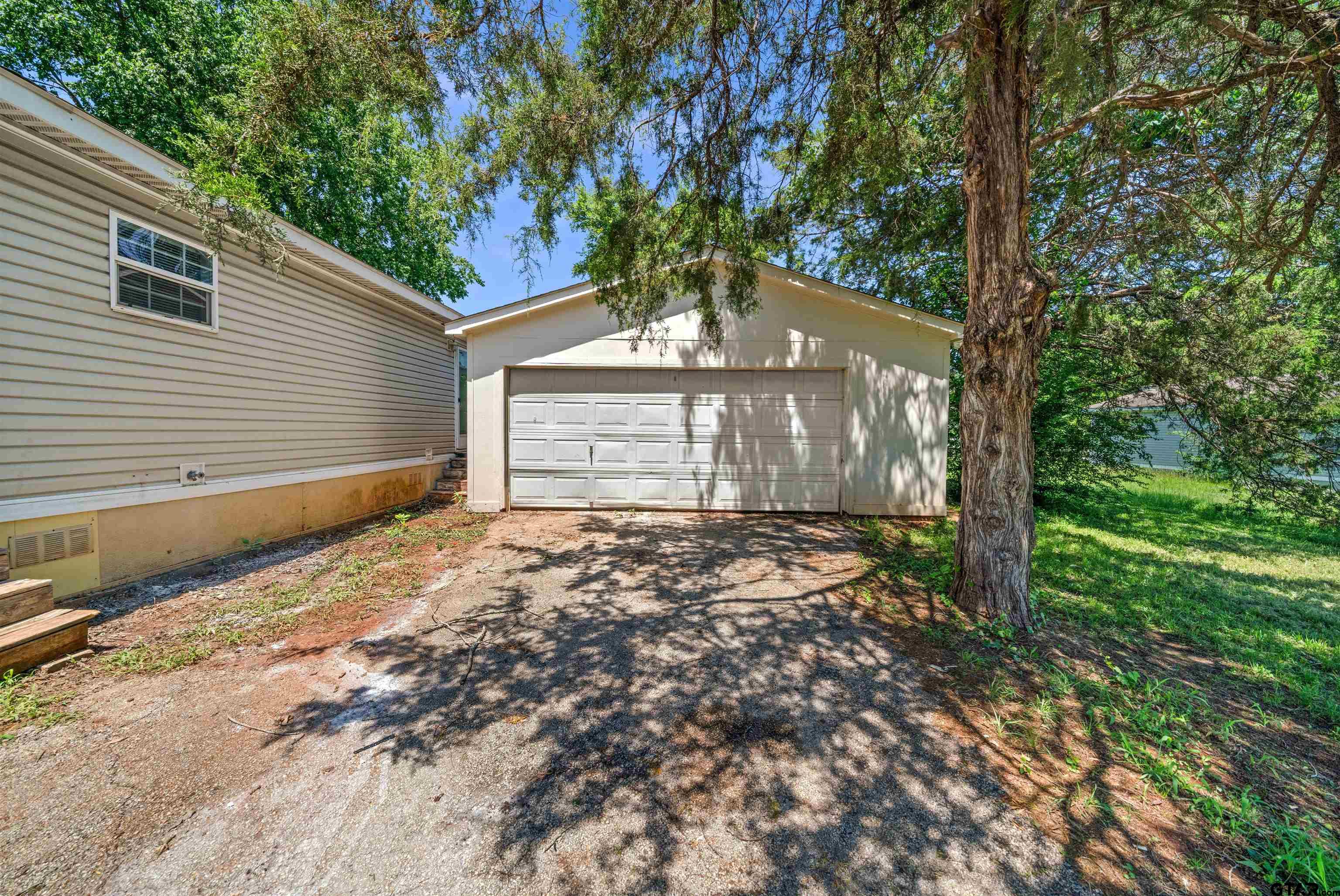 10490 Peterson Tyler, TX 75708 - Photo 29 of 30 a front view of a house with a yard