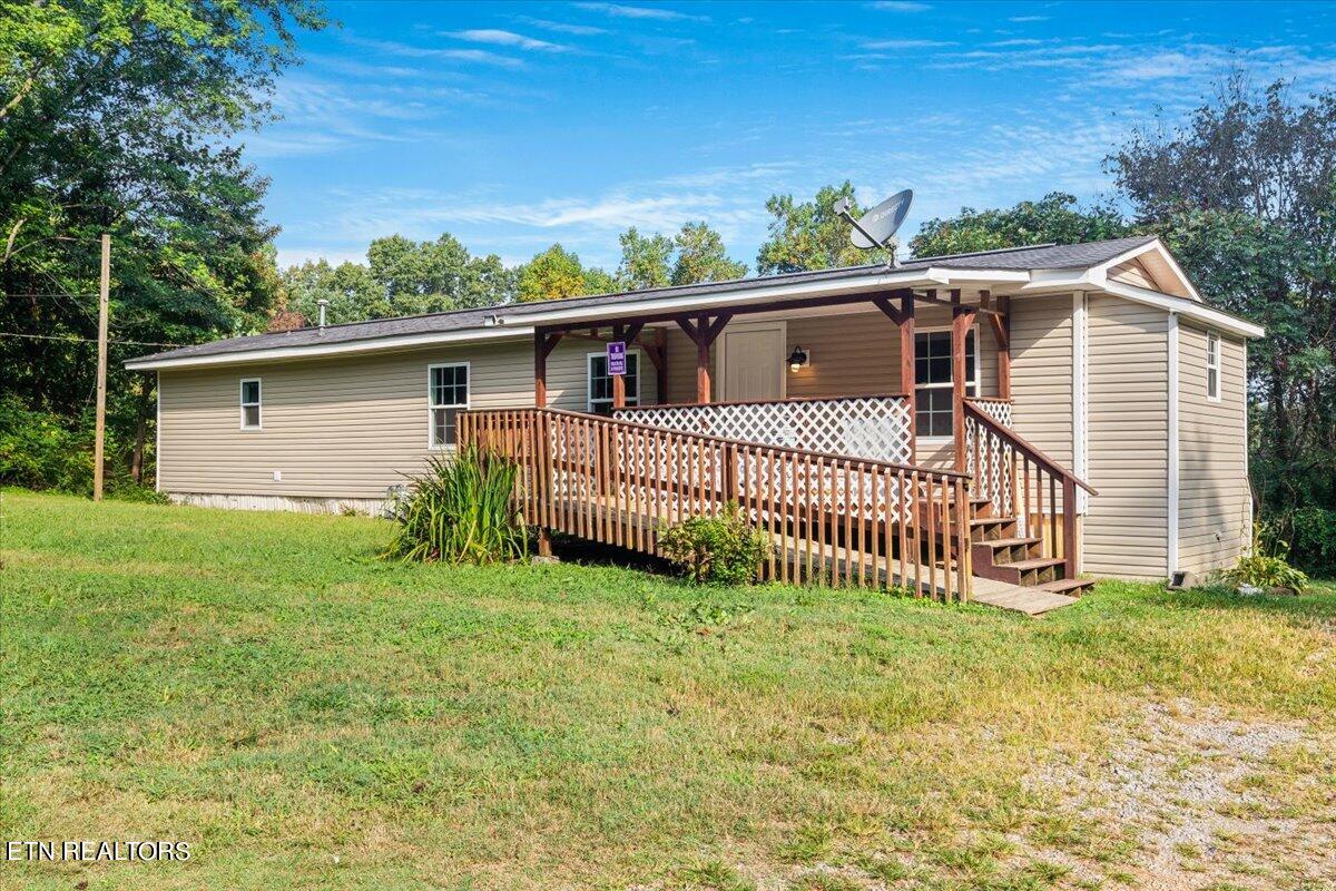 211 Clear Branch Road Rocky Top, TN 37769 - Photo 1 of 35 Handicap ramp