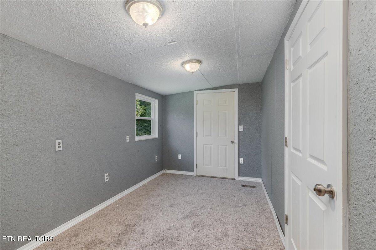 211 Clear Branch Road Rocky Top, TN 37769 - Photo 23 of 35 23-Bedroom 1