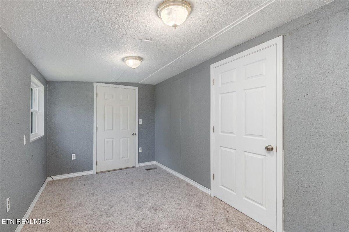 211 Clear Branch Road Rocky Top, TN 37769 - Photo 24 of 35 22-Bedroom 1
