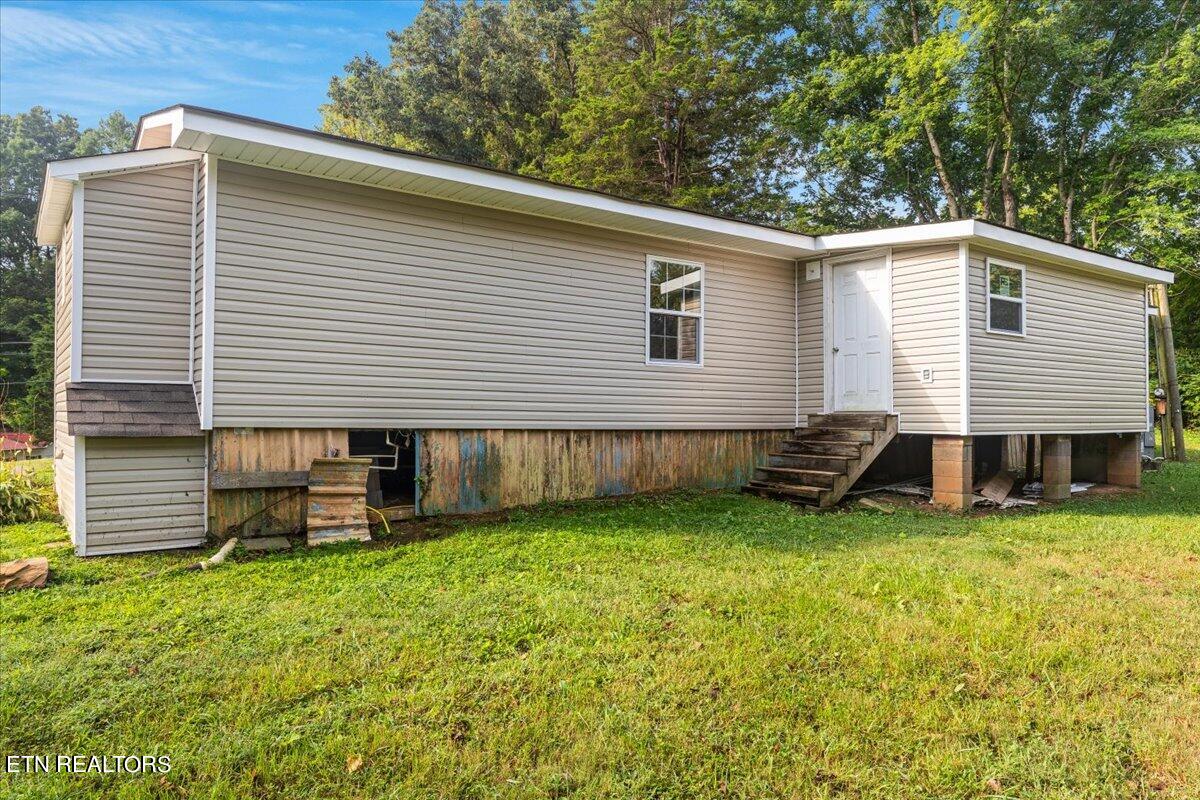 211 Clear Branch Road Rocky Top, TN 37769 - Photo 29 of 35 30-Exterior Back