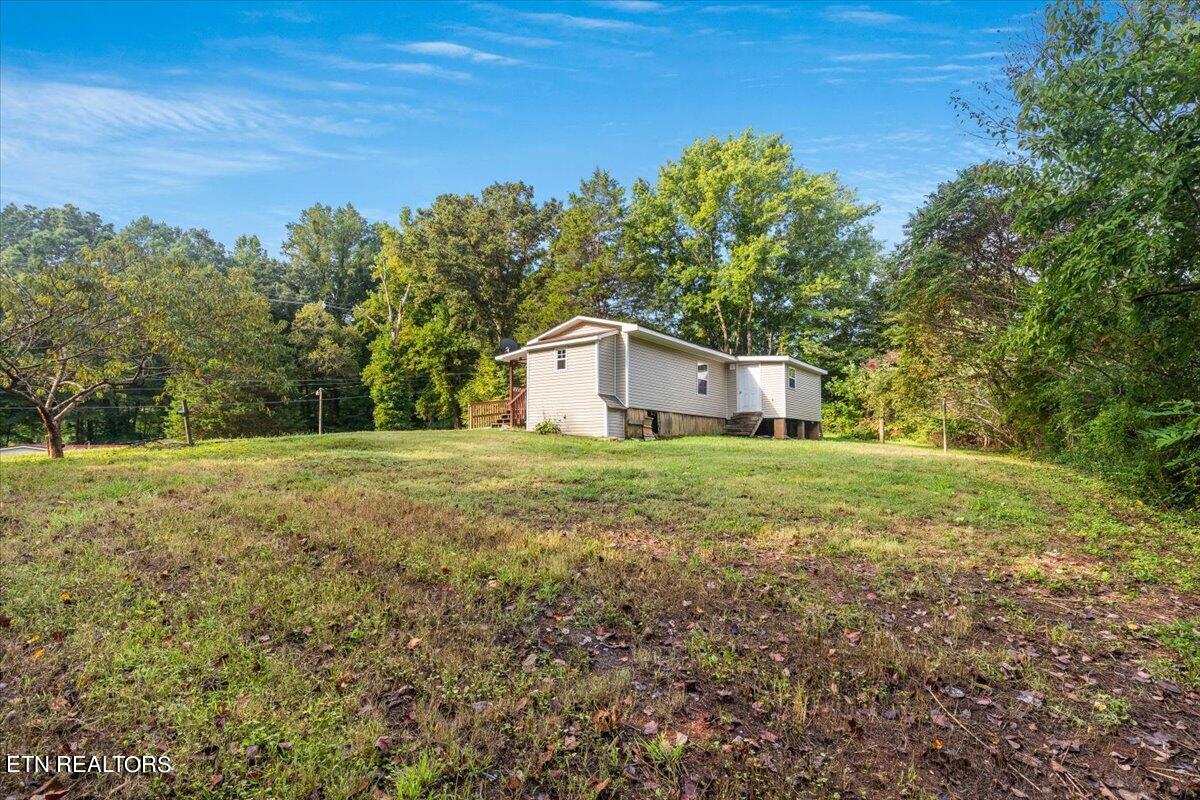 211 Clear Branch Road Rocky Top, TN 37769 - Photo 31 of 35 31-Backyard