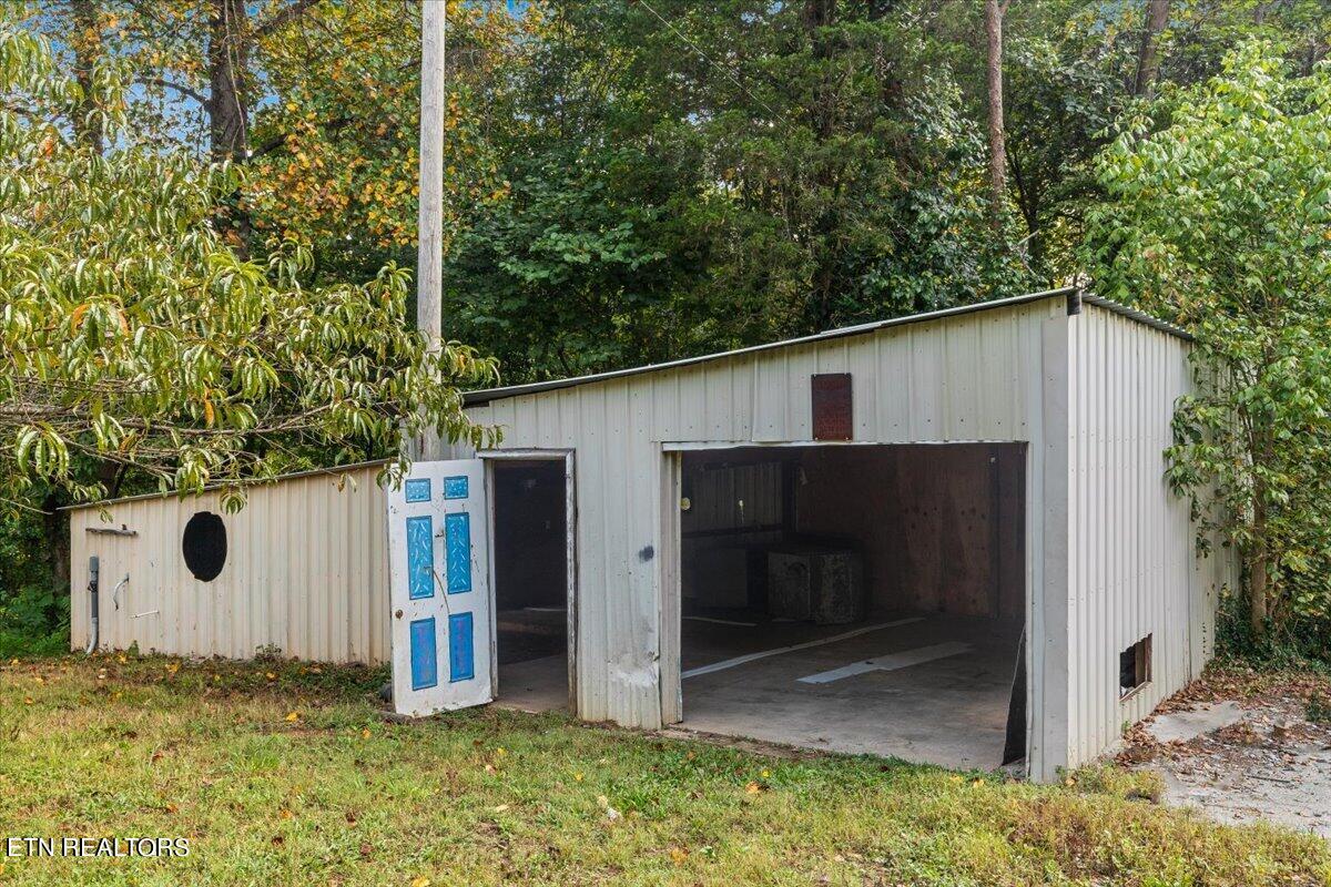 211 Clear Branch Road Rocky Top, TN 37769 - Photo 33 of 35 33-Shed