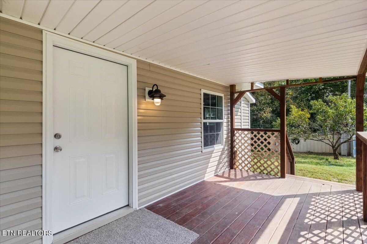 211 Clear Branch Road Rocky Top, TN 37769 - Photo 5 of 35 Covered Porch