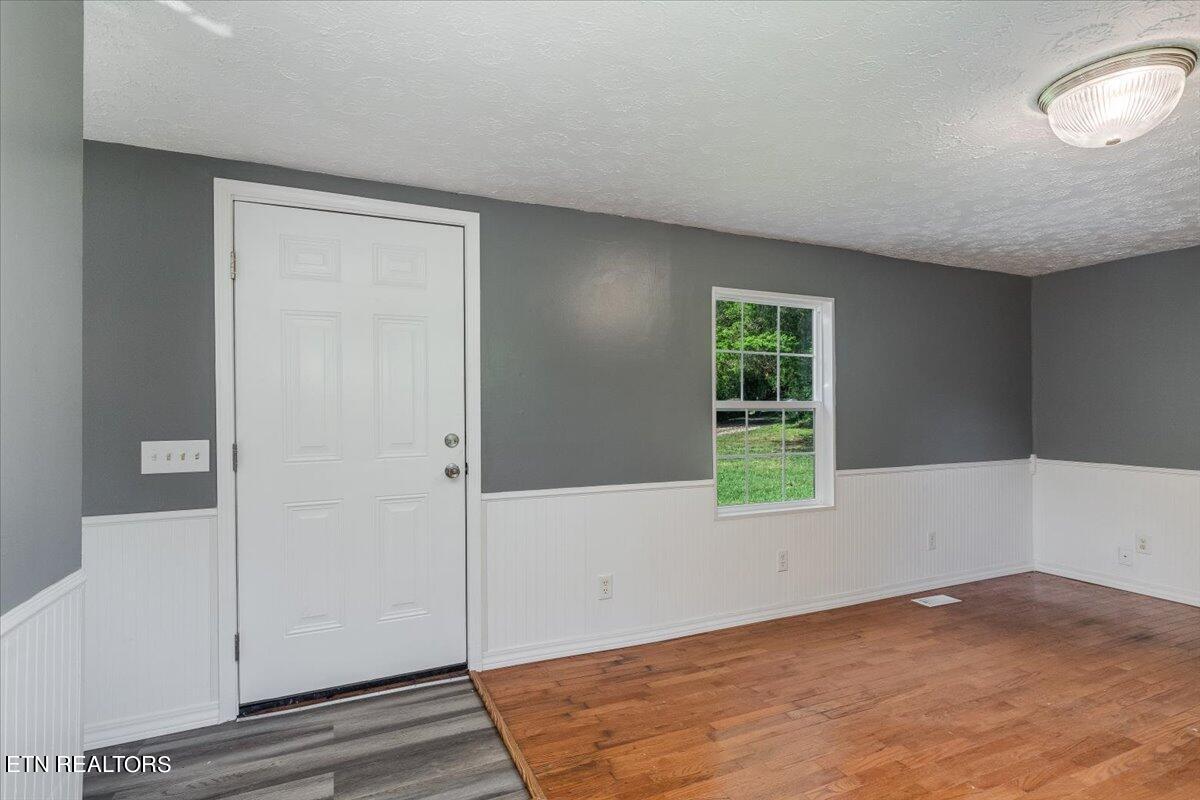 211 Clear Branch Road Rocky Top, TN 37769 - Photo 8 of 35 front door / living room