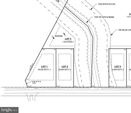 a black and white photo of a field