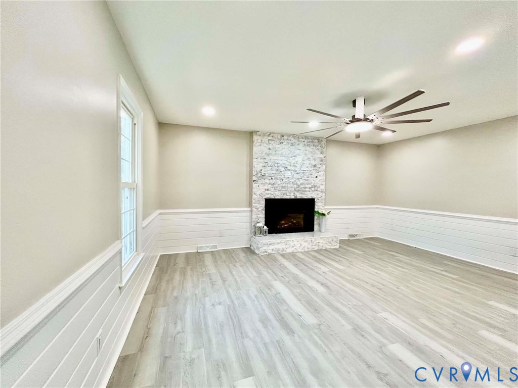 7110 Manning Road Chesterfield, VA 23832 - Photo 10 of 50 Spacious living area showcasing wood-finish floori