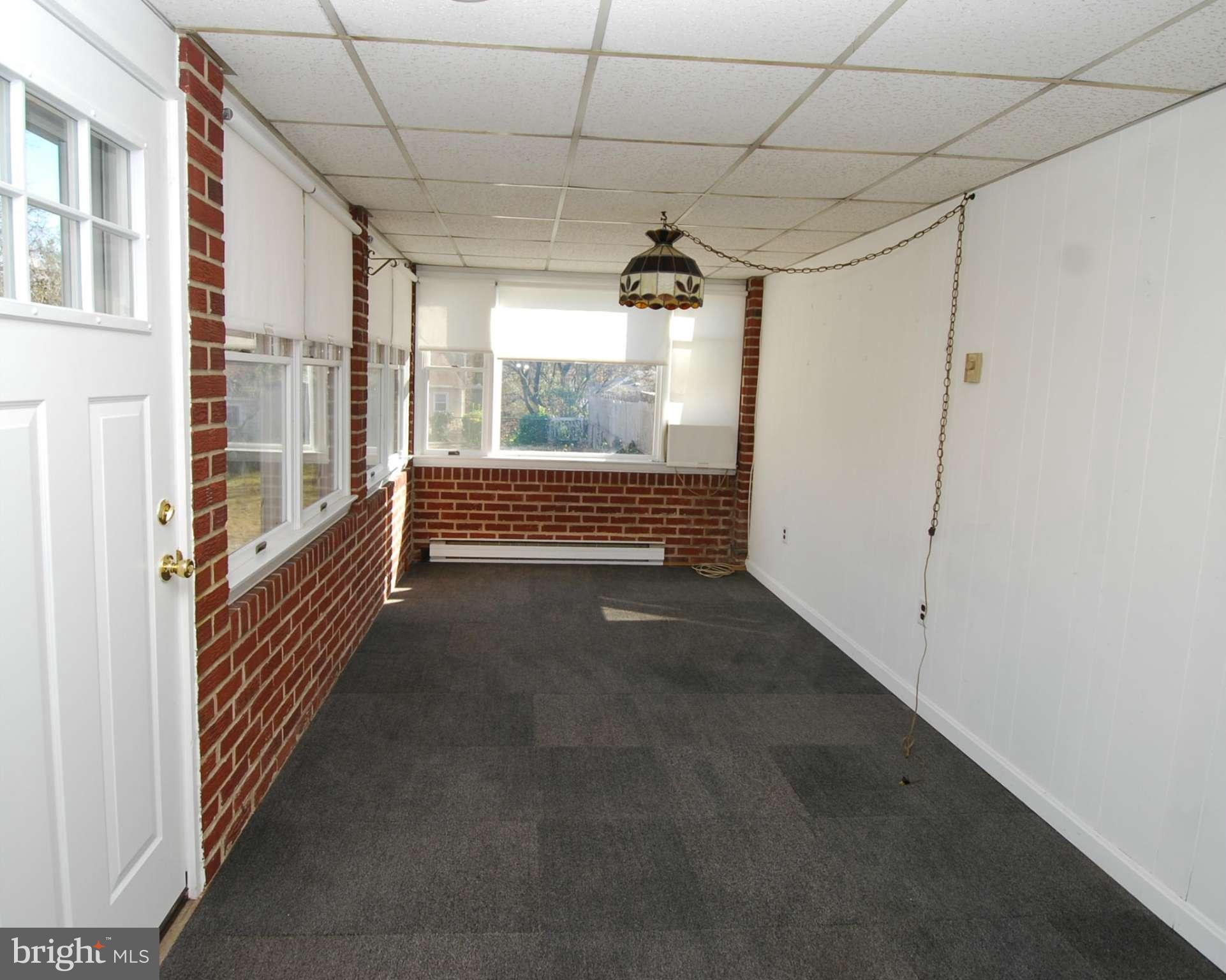 11967 Andrew Street Silver Spring, MD 20902 - Photo 14 of 21 Sun Room