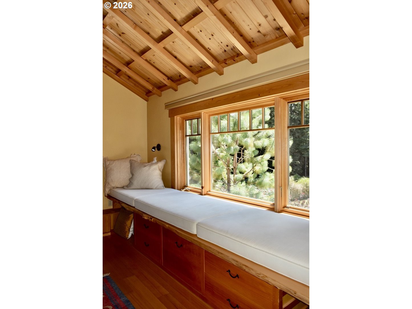97137 North Bank Rogue River Road Gold Beach, OR 97444 - Photo 15 of 40 a bathroom with a sink and a large mirror