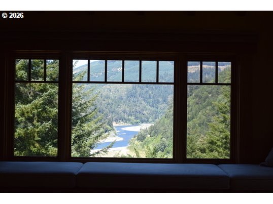 97137 North Bank Rogue River Road Gold Beach, OR 97444 - Photo 18 of 40 a view of sky from window