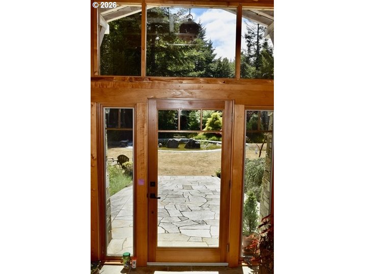 97137 North Bank Rogue River Road Gold Beach, OR 97444 - Photo 22 of 40 a picture of a door