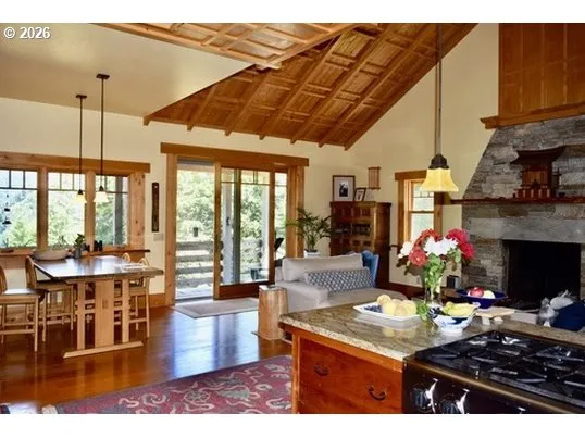 a living room with lots of furniture and a table