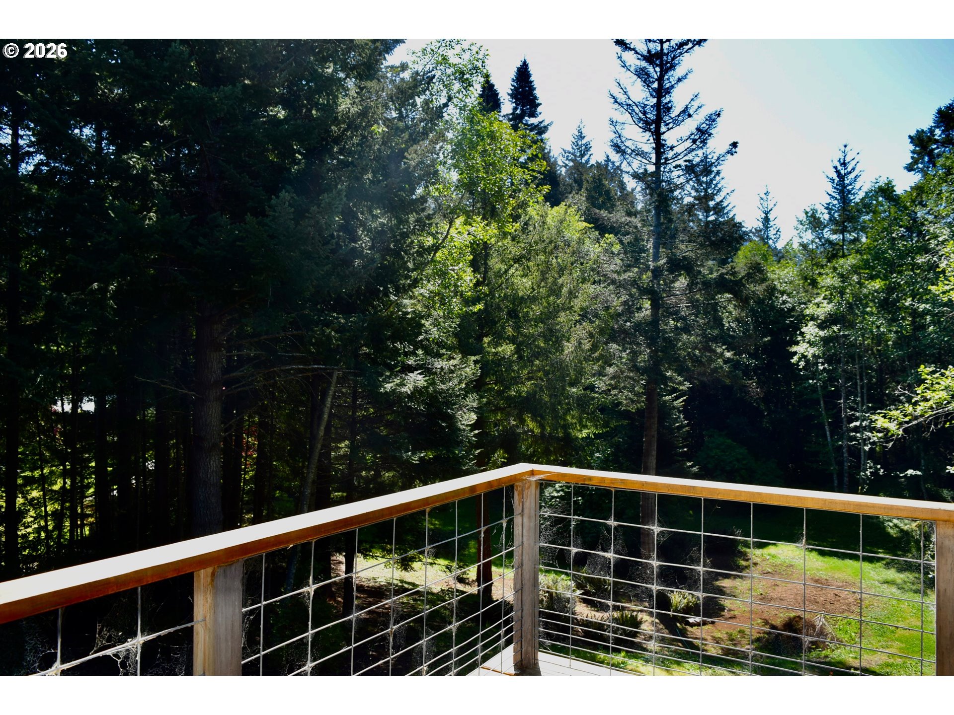 97137 North Bank Rogue River Road Gold Beach, OR 97444 - Photo 43 of 44 a view of balcony with a pot
