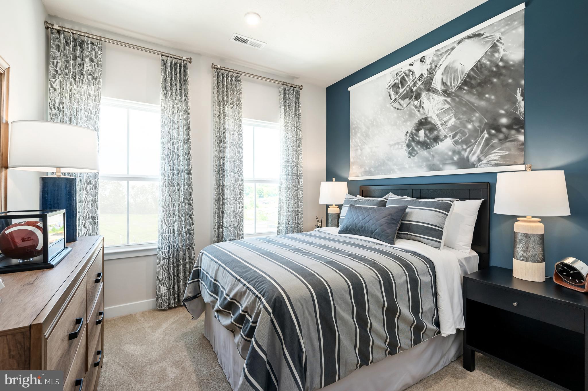 8548 Branch Side Way, Unit B Brandywine, MD 20613 - Photo 18 of 21 a bedroom with a bed and a window