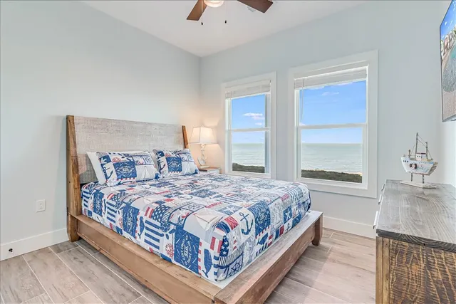 a bedroom with a bed and a cabinets