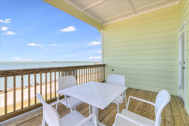 a view of a balcony with chair