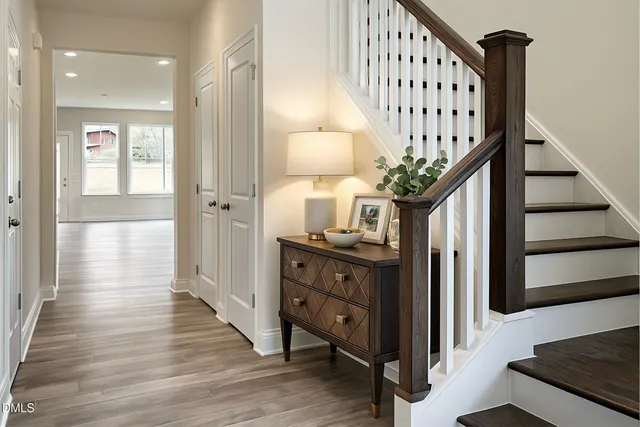 a view of entryway with wooden floor