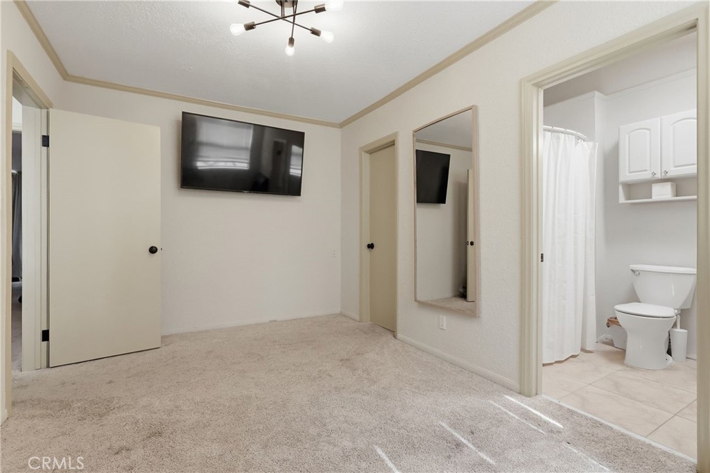 1540 East Wardlow Road Long Beach, CA 90807 - Photo 14 of 38 a view of a livingroom with wooden floor and a bathroom