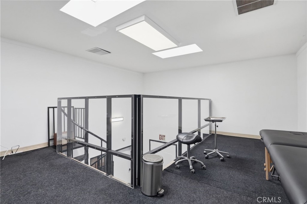 1540 East Wardlow Road Long Beach, CA 90807 - Photo 33 of 38 a view of a hallway with seating area