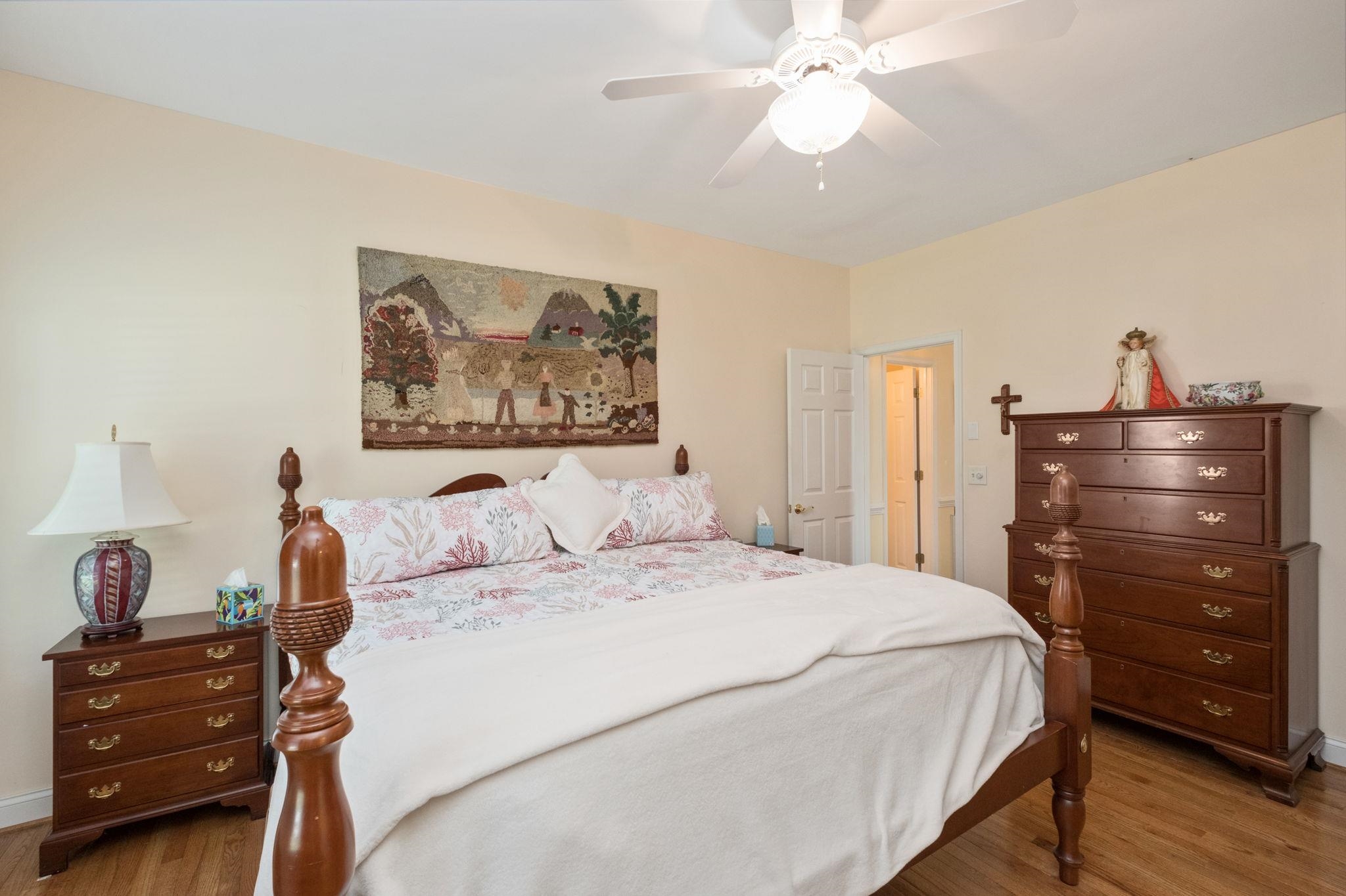 35 Buckingham Common Waynesboro, VA 22980 - Photo 17 of 33 a bedroom with a bed and a chandelier