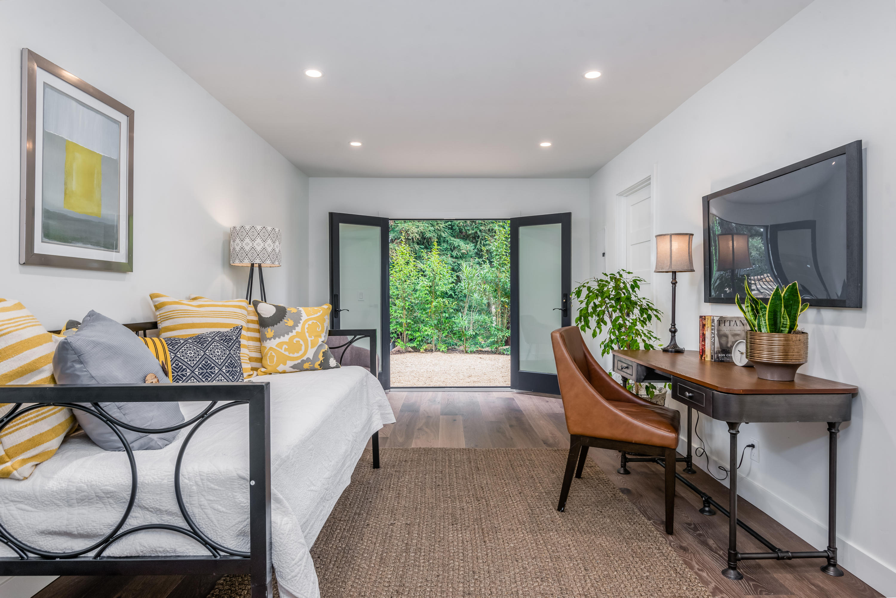 925 El Rancho Road Santa Barbara, CA 93108 - Photo 14 of 20 a bedroom with furniture and a window