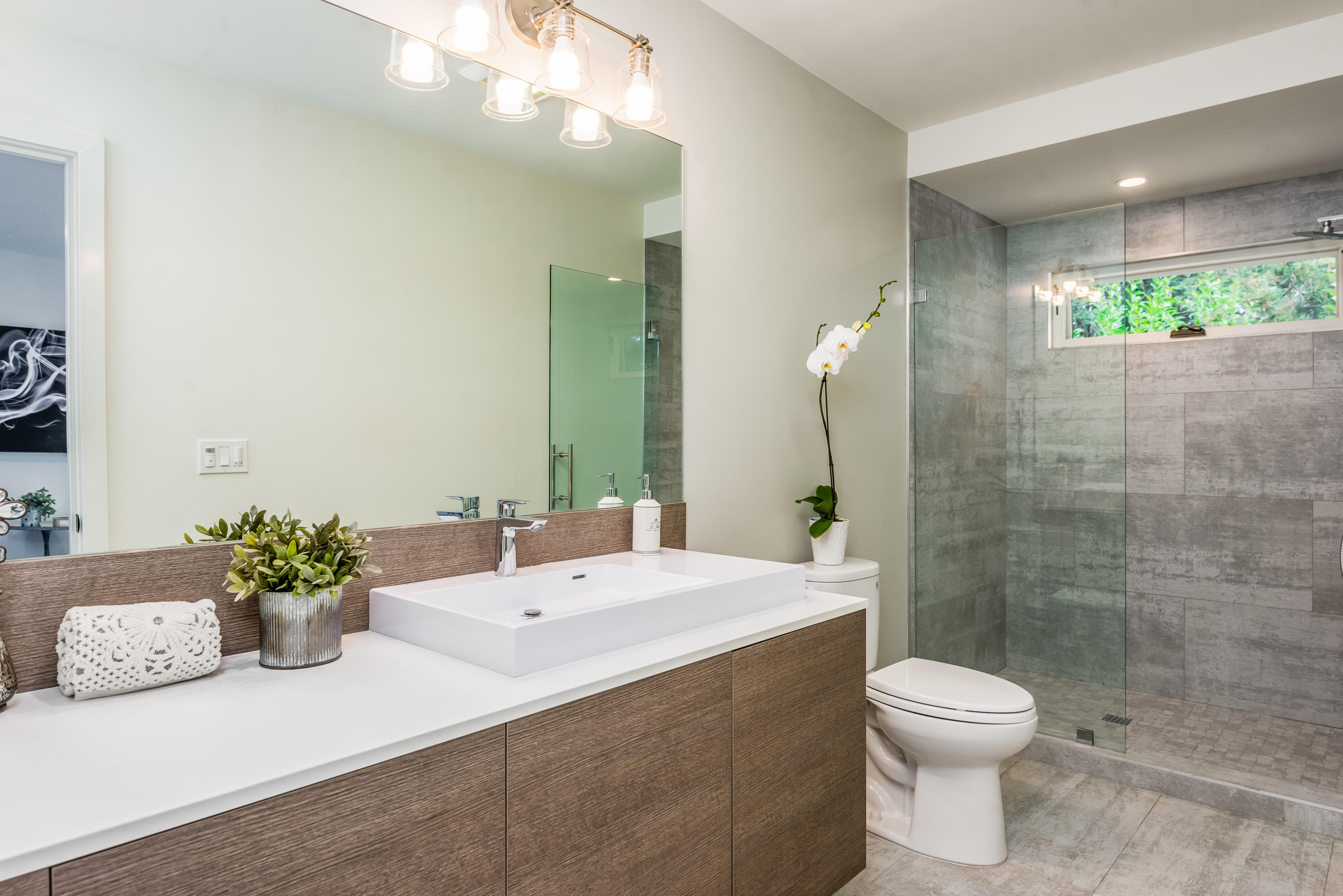 925 El Rancho Road Santa Barbara, CA 93108 - Photo 18 of 20 a bathroom with a sink a toilet and shower
