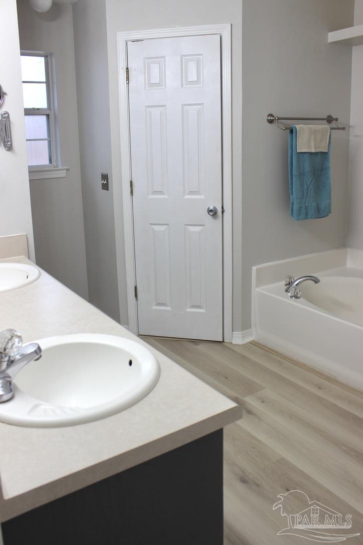 5129 Goshawk Drive Milton, FL 32570 - Photo 30 of 54 Dual vanities, separate shower & tub